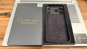 Black MagSafe compatible phone case with rear e-ink screen